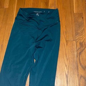 dark blue/greenish cross over American eagle leggings
